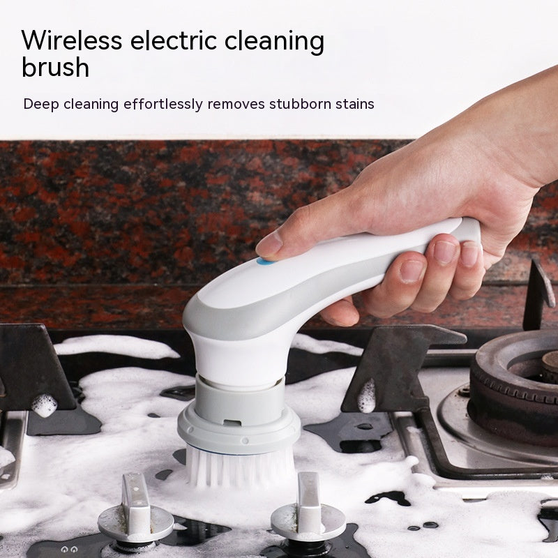 Electric spin scrubber cleaning kitchen stove top surface